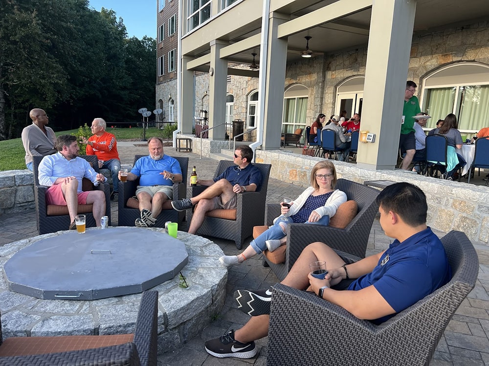 LNF members relaxing together on a patio